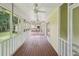 Spacious screened-in porch, perfect for enjoying nature from the comfort of your home with relaxing seating and beautiful view at 2110 Waterloo Cir, Lawrenceville, GA 30043