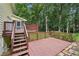 Inviting wooden deck perfect for outdoor gatherings with the surrounding woods providing a private setting at 2110 Waterloo Cir, Lawrenceville, GA 30043