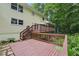 Lovely outdoor wooden deck with a nice view of the surrounding greenery, perfect for relaxation and entertainment at 2110 Waterloo Cir, Lawrenceville, GA 30043