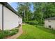 Spacious grassy backyard offers ample space for outdoor activities and relaxation at 2432 Kelly Lake Dr, Decatur, GA 30032