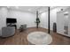 Spacious basement with modern flooring, two structural poles, and a cozy sitting area at 2432 Kelly Lake Dr, Decatur, GA 30032