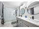 Beautifully updated bathroom features a spacious shower, double vanity, and stylish lighting at 2432 Kelly Lake Dr, Decatur, GA 30032