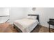 Cozy bedroom features wood-look flooring, a comfortable bed and an abundance of natural light at 2432 Kelly Lake Dr, Decatur, GA 30032