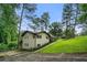 Well-maintained single-story house with lush lawn and mature trees at 2432 Kelly Lake Dr, Decatur, GA 30032