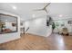 Spacious living area offering wood grain floors and a view to the dining area and staircase at 2432 Kelly Lake Dr, Decatur, GA 30032