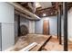 Unfinished basement featuring exposed ductwork, support beams and concrete floor at 265 Forest Lake Dr, Covington, GA 30016