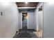 Hallway in the unfinished basement with access to other rooms at 265 Forest Lake Dr, Covington, GA 30016