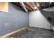 Unfinished basement space with painted block walls and concrete floor at 265 Forest Lake Dr, Covington, GA 30016