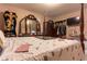 Bedroom featuring a four-poster bed and decor celebrating the New Orleans Saints at 265 Forest Lake Dr, Covington, GA 30016
