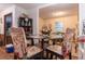 Dining area with views into a sitting room at 265 Forest Lake Dr, Covington, GA 30016