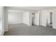 Open bedroom layout with hallway leading to ensuite bathroom and closet at 386 Tallulah Ln, Grayson, GA 30017