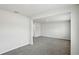 Bright bedroom featuring plush carpeting, light walls, and neutral trim at 386 Tallulah Ln, Grayson, GA 30017