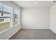 Bright bedroom with plush carpeting and large window at 386 Tallulah Ln, Grayson, GA 30017