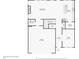 Detailed first floor plan featuring a garage, kitchen, living room and dimensions for space planning at 386 Tallulah Ln, Grayson, GA 30017