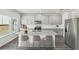 Modern kitchen with stainless steel appliances and island, great for cooking at 386 Tallulah Ln, Grayson, GA 30017