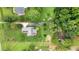 Estate aerial view of property with plenty of space and mature greenery on a large lot at 3992 Spot Rd, Cumming, GA 30040