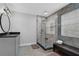 Modern bathroom showcasing a glass-enclosed shower and sleek vanity at 3992 Spot Rd, Cumming, GA 30040