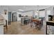 Bright kitchen features stainless appliances, an island, and a breakfast nook at 3992 Spot Rd, Cumming, GA 30040