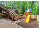 Backyard features a playground and wooden stairs at 5114 N Ivy Ne Rd, Atlanta, GA 30342
