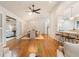 Open living area featuring vaulted ceilings, hardwood floors, and a view to the kitchen and dining room at 5114 N Ivy Ne Rd, Atlanta, GA 30342