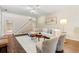 Cozy living room features a staircase, nice decor, and updated flooring at 5114 N Ivy Ne Rd, Atlanta, GA 30342