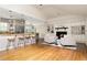 Inviting living area featuring a bar counter, fireplace, built-ins and open layout, perfect for entertaining at 5114 N Ivy Ne Rd, Atlanta, GA 30342