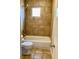 Bathroom with tile surround and a window for natural light at 561 Formwalt Sw St # 7, Atlanta, GA 30312