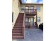 Apartment building exterior with stairs leading to the upper-level units at 561 Formwalt Sw St # 7, Atlanta, GA 30312