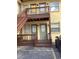 Two-story apartment building features gray doors and brown stairs to the second level at 561 Formwalt Sw St # 7, Atlanta, GA 30312