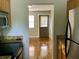 Well-lit kitchen has granite countertops, stainless steel appliances, and wood cabinets at 561 Formwalt Sw St # 7, Atlanta, GA 30312