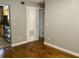 The living room has wood flooring and an entry view of the kitchen at 561 Formwalt Sw St # 7, Atlanta, GA 30312