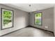 Bright bedroom with natural light and hardwood floors offers a serene retreat at 1902 Memorial Se Dr, Atlanta, GA 30317