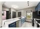 Well-appointed kitchen with a large island, stainless steel appliances, and modern finishes at 1902 Memorial Se Dr, Atlanta, GA 30317