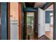 Hallway with multiple doorways and an open view of different rooms at 3020 Washington Rd, East Point, GA 30344