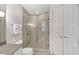 Clean bathroom features glass shower and white double doors at 3344 Peachtree Ne Rd # 3504, Atlanta, GA 30326