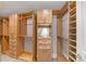 Walk-in closet with custom shelving and drawers providing plenty of storage space at 3344 Peachtree Ne Rd # 3504, Atlanta, GA 30326