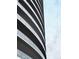 Modern architecture showcases sleek exterior of building with rows of balconies and city views at 3344 Peachtree Ne Rd # 3504, Atlanta, GA 30326