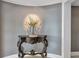 Hallway with decorative table and vase, and neutral colors at 3344 Peachtree Ne Rd # 3504, Atlanta, GA 30326