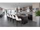 Modern kitchen featuring an oversized island with seating and stainless steel appliances at 3344 Peachtree Ne Rd # 3504, Atlanta, GA 30326
