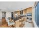 Modern kitchen with a large island, stainless steel appliances, and stylish barstool seating at 3344 Peachtree Ne Rd # 3504, Atlanta, GA 30326