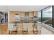 Open kitchen featuring granite countertops, custom cabinetry, and stainless steel appliances with city views at 3344 Peachtree Ne Rd # 3504, Atlanta, GA 30326
