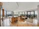 Open concept living and kitchen area, with expansive windows offering panoramic city views at 3344 Peachtree Ne Rd # 3504, Atlanta, GA 30326