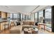 Open concept living area with kitchen, expansive windows and views at 3344 Peachtree Ne Rd # 3504, Atlanta, GA 30326