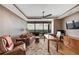 Comfortable living space with a ceiling fan, natural light and comfortable seating at 3344 Peachtree Ne Rd # 3504, Atlanta, GA 30326