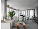 Spacious living room with modern decor, piano, ample seating, and floor-to-ceiling windows at 3344 Peachtree Ne Rd # 3504, Atlanta, GA 30326