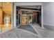A glass-enclosed lobby entrance with a door that says 'Sovereign Residences' at 3344 Peachtree Ne Rd # 3504, Atlanta, GA 30326