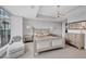 Bright main bedroom features a city view, elegant chandelier, and neutral decor at 3344 Peachtree Ne Rd # 3504, Atlanta, GA 30326