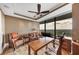 Bright office with large windows, brown leather arm chair, wooden desk, and scenic outdoor view at 3344 Peachtree Ne Rd # 3504, Atlanta, GA 30326