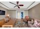Bright office with a television, and a view into a half bath with decorative wall paper at 3344 Peachtree Ne Rd # 3504, Atlanta, GA 30326
