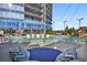 The building has a rooftop pool with lounge chairs and views of the city at 3344 Peachtree Ne Rd # 3504, Atlanta, GA 30326